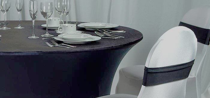 Spandex Black stretch round banquet table cover with chairs in white spandex cover.